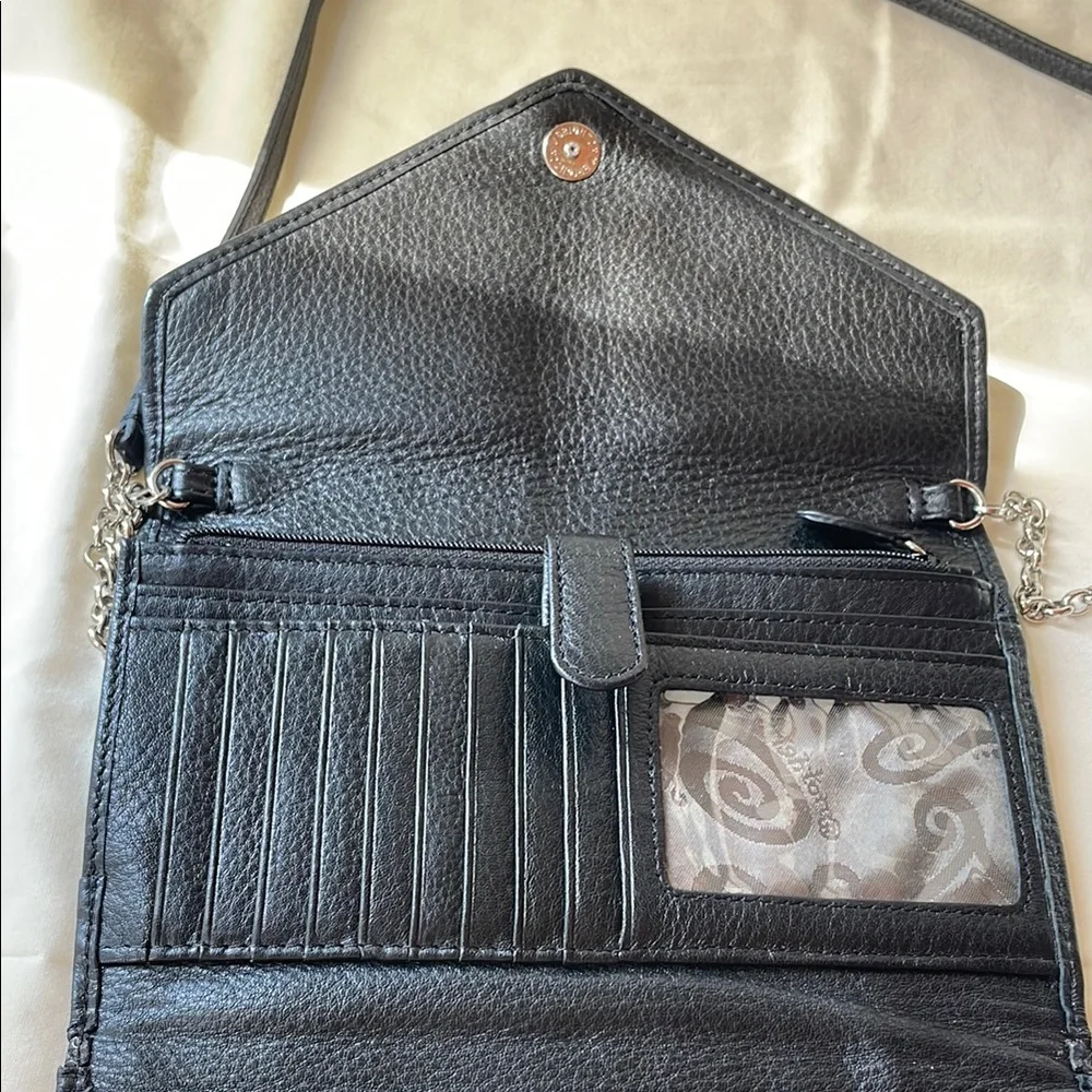 Brighton Black Crossbody Bag with Sleek Leather and Metallic Accents - Picture 5 of 11